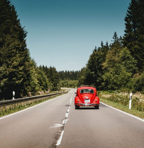 A car driving on a road in the Eifel